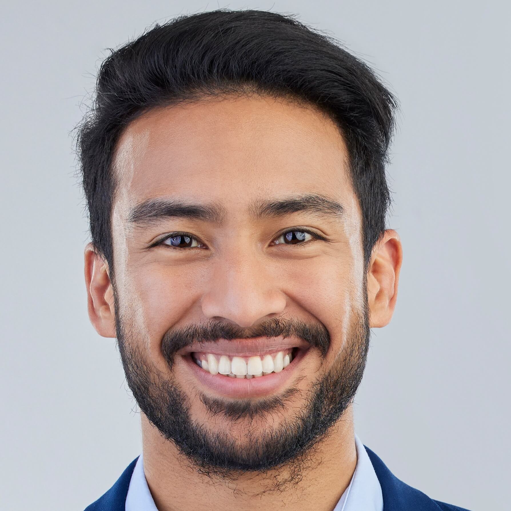 business-man-smile-and-fashion-portrait-in-studio-2023-11-27-05-35-17-utc-Cropped.jpg